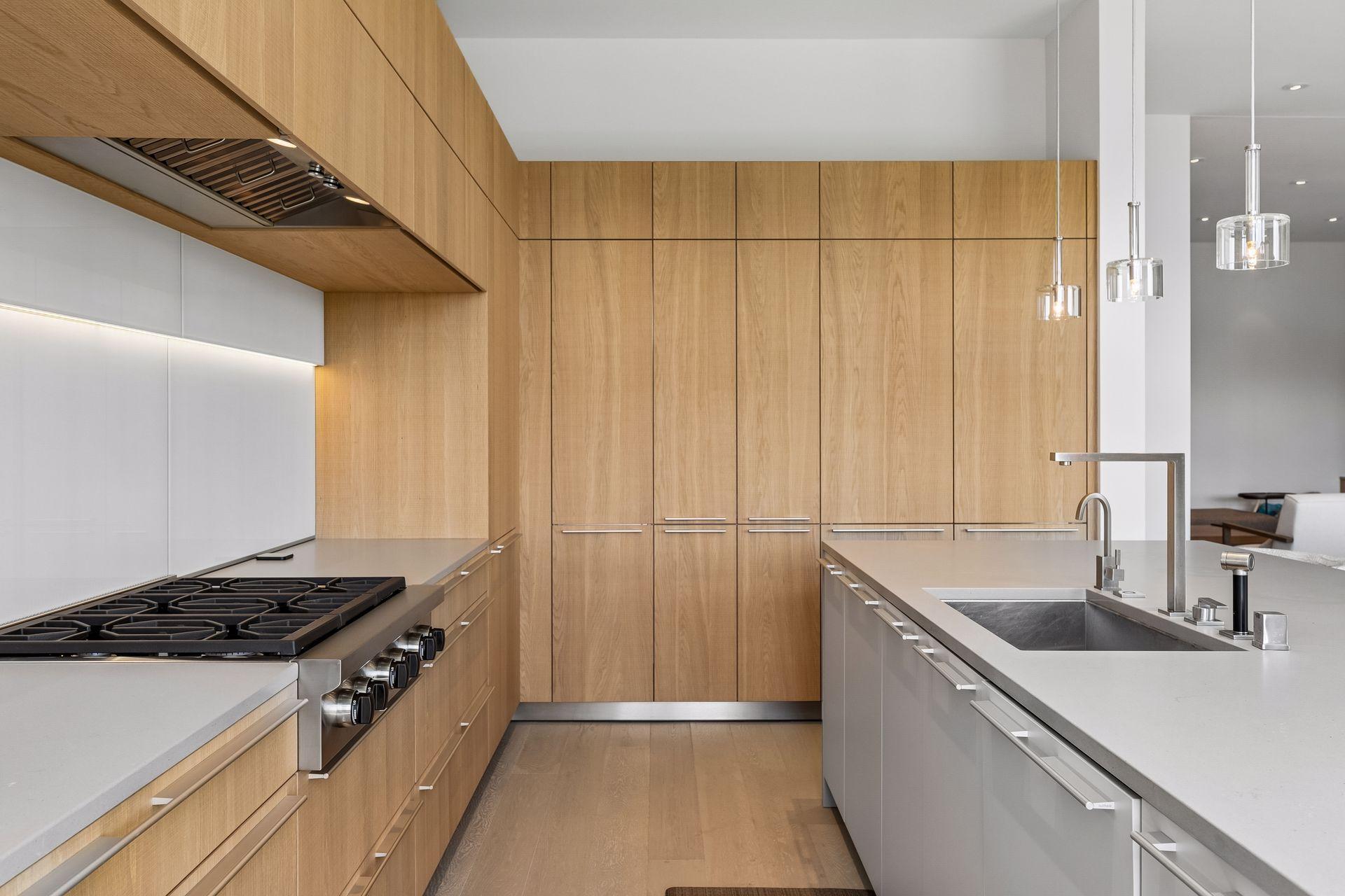Warm natural wood with crisp countertops