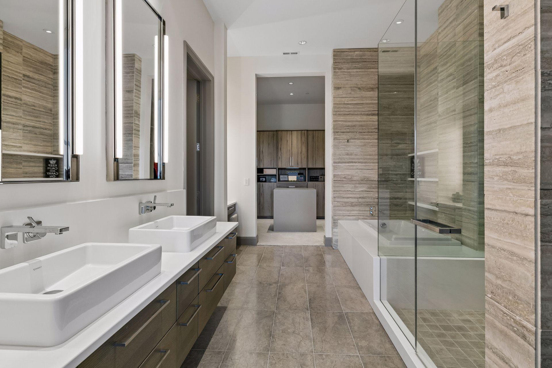 Step into the spa-like primary bathroom