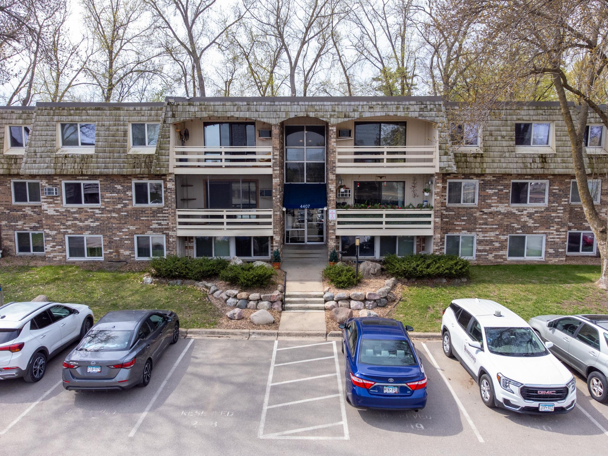 Unit #309 is tucked back amongst the trees - offering wonderful privacy, reserved parking spot 222.