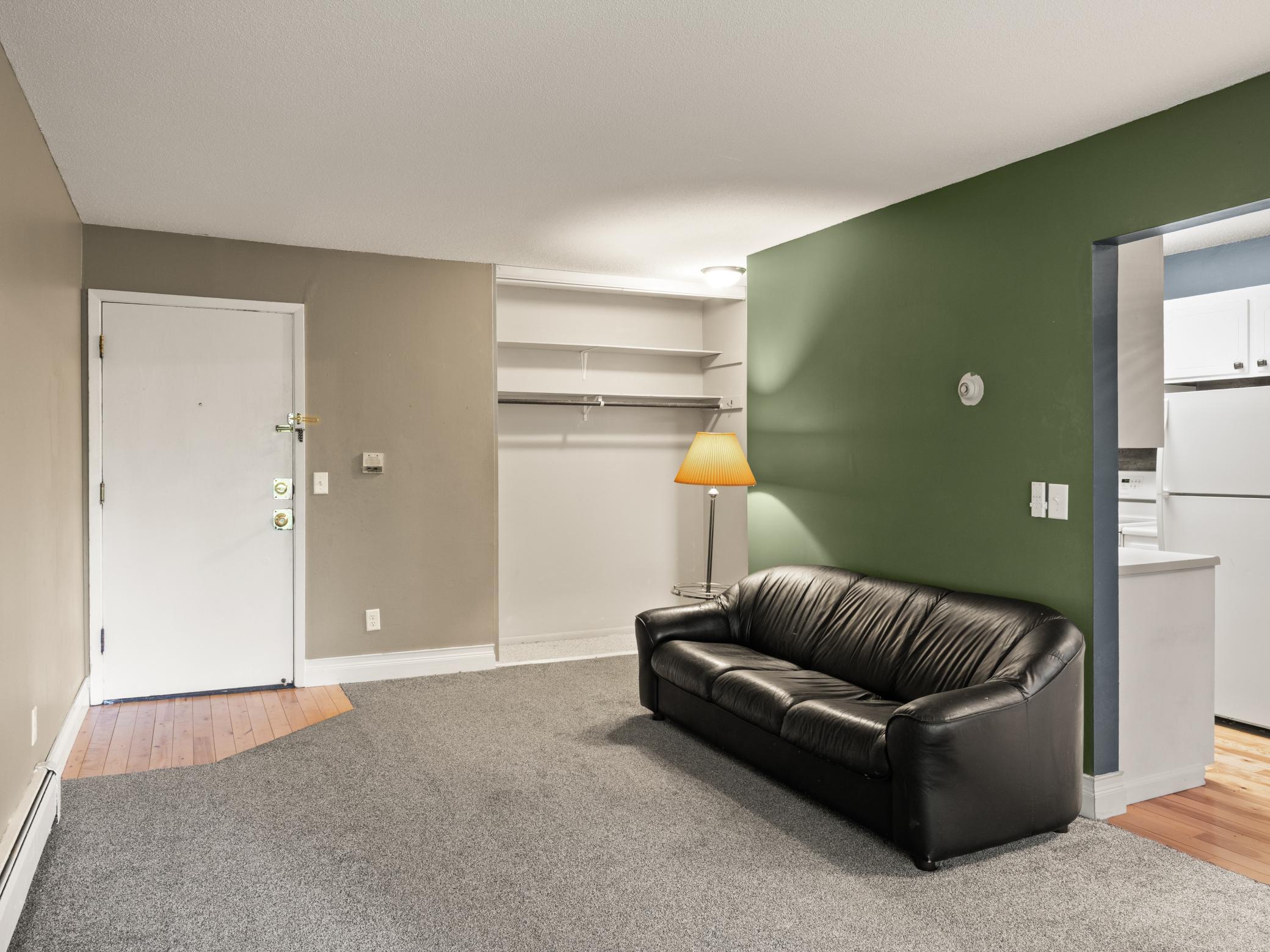 Wood flooring at entry, large hall closets.