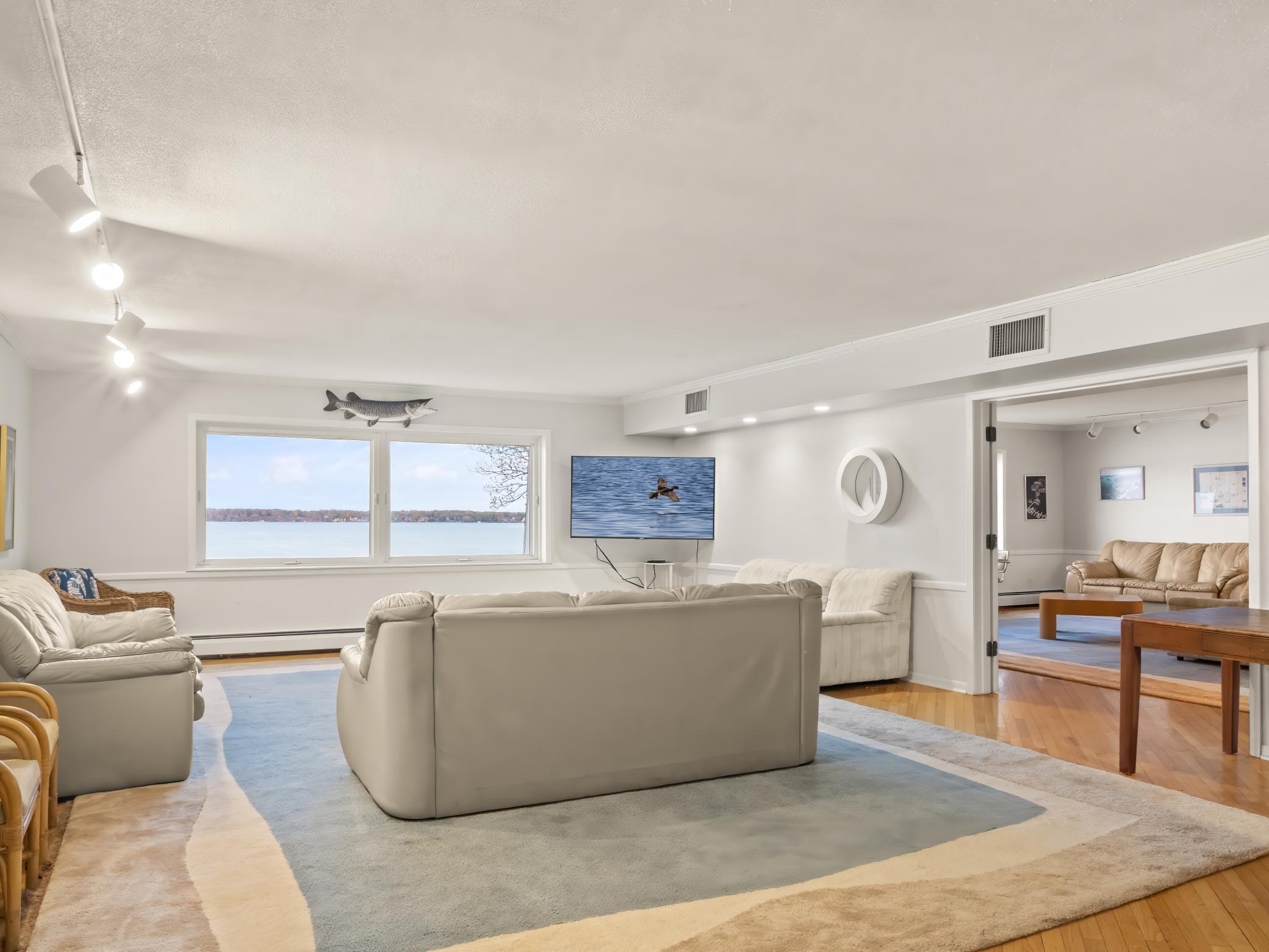 The Admirals Club - party room, community room - lake views, fireplace, kitchen, wet bar.
