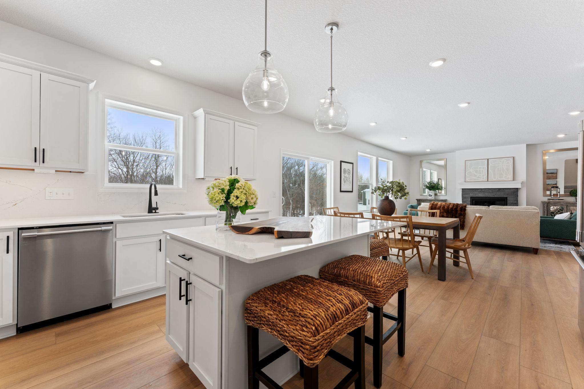 The open floorplan provides ample light and flow to this stylish home
