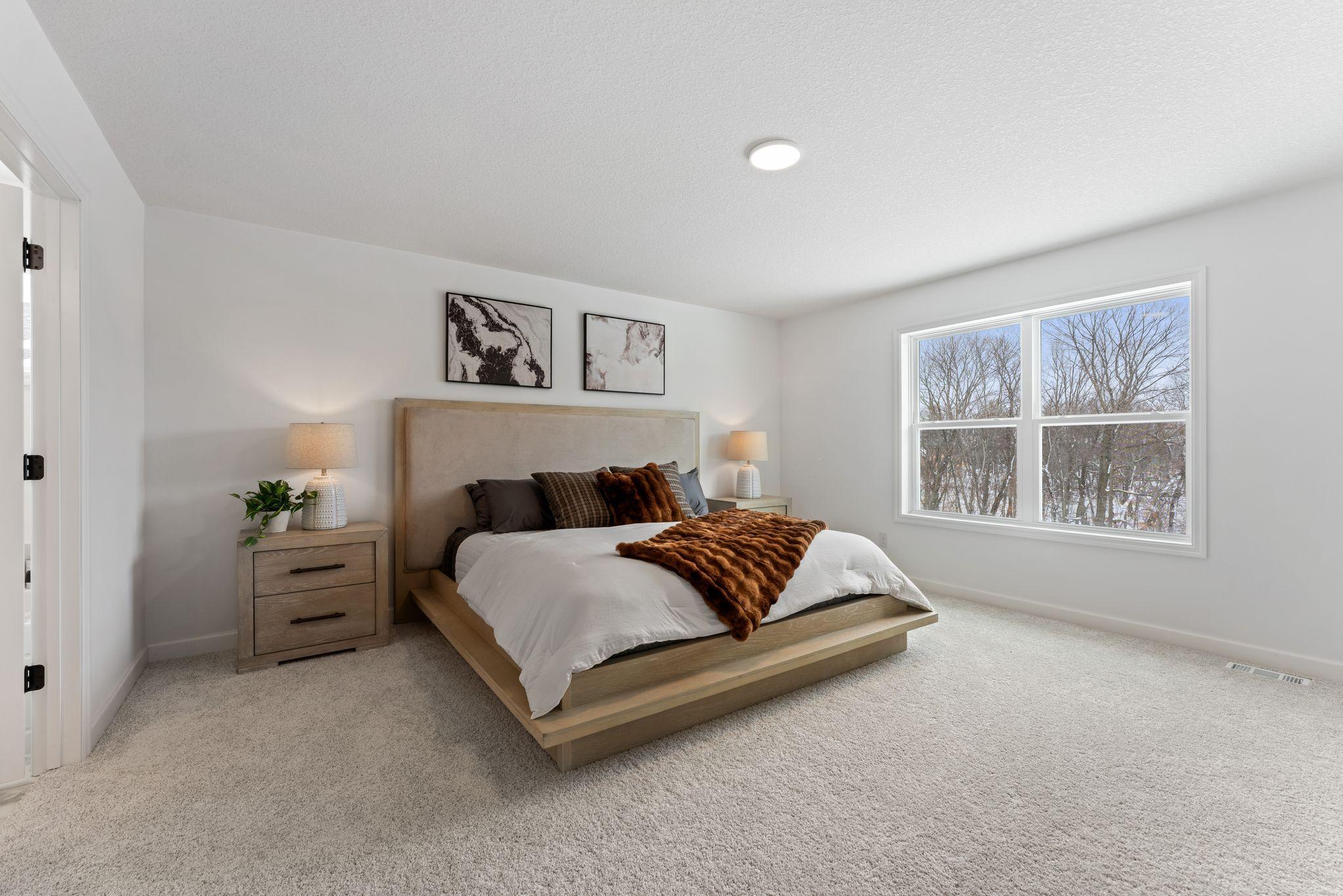 Providing the upmost in privacy, the luxurious owner’s suite is located on the second level and has a walk-in closet and en-suite bathroom.