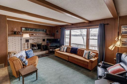 Step inside and see the living room with a wood burning fireplace. Lots of cozy evenings here!