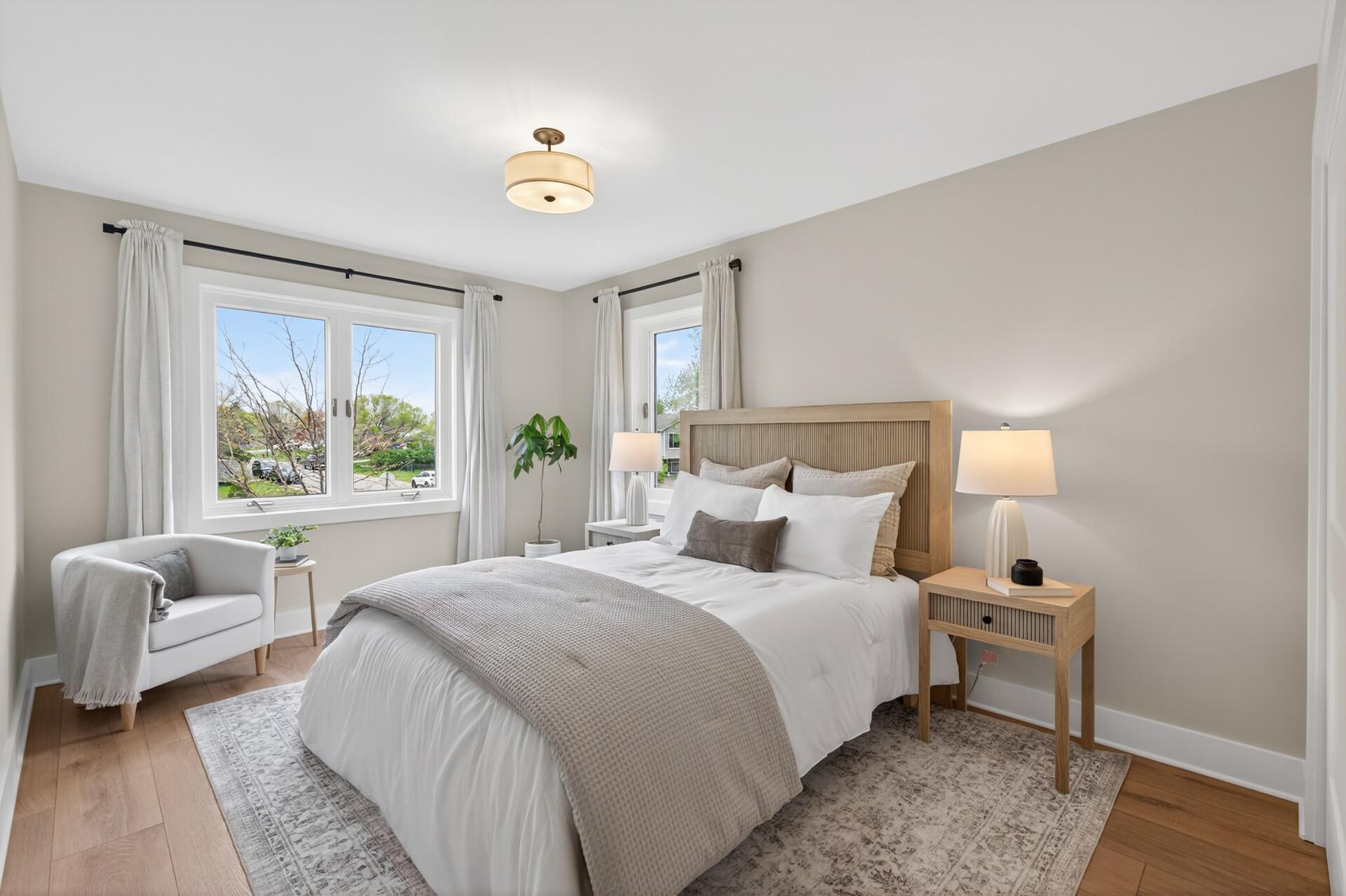 Comfortable upper-level bedroom. features large windows, upper level trim and closet oranizers!