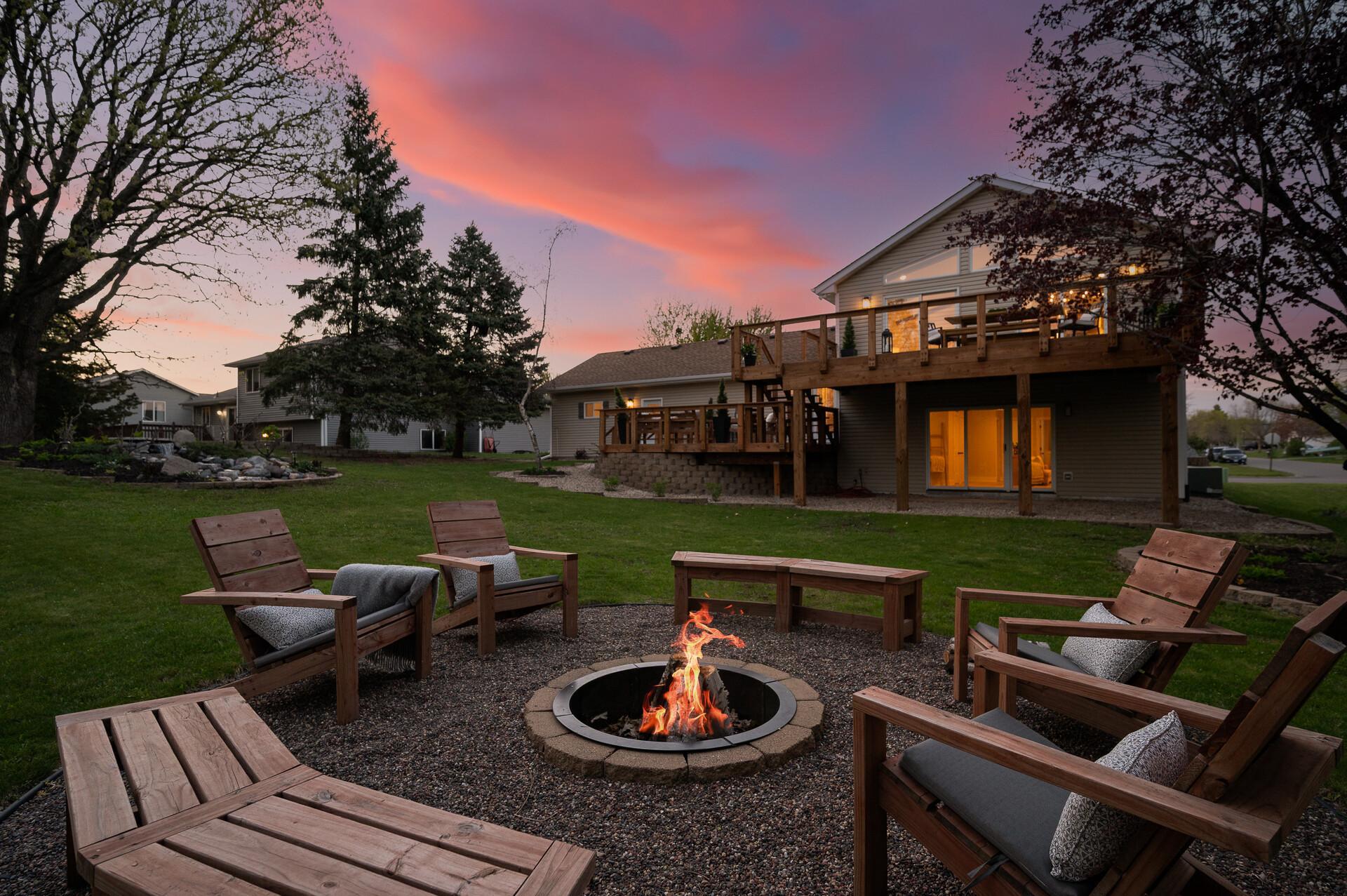 From sunset gatherings around the fire pit to evenings spent on the expansive deck, this backyard was designed to maximize both comfort and to connect with nature.