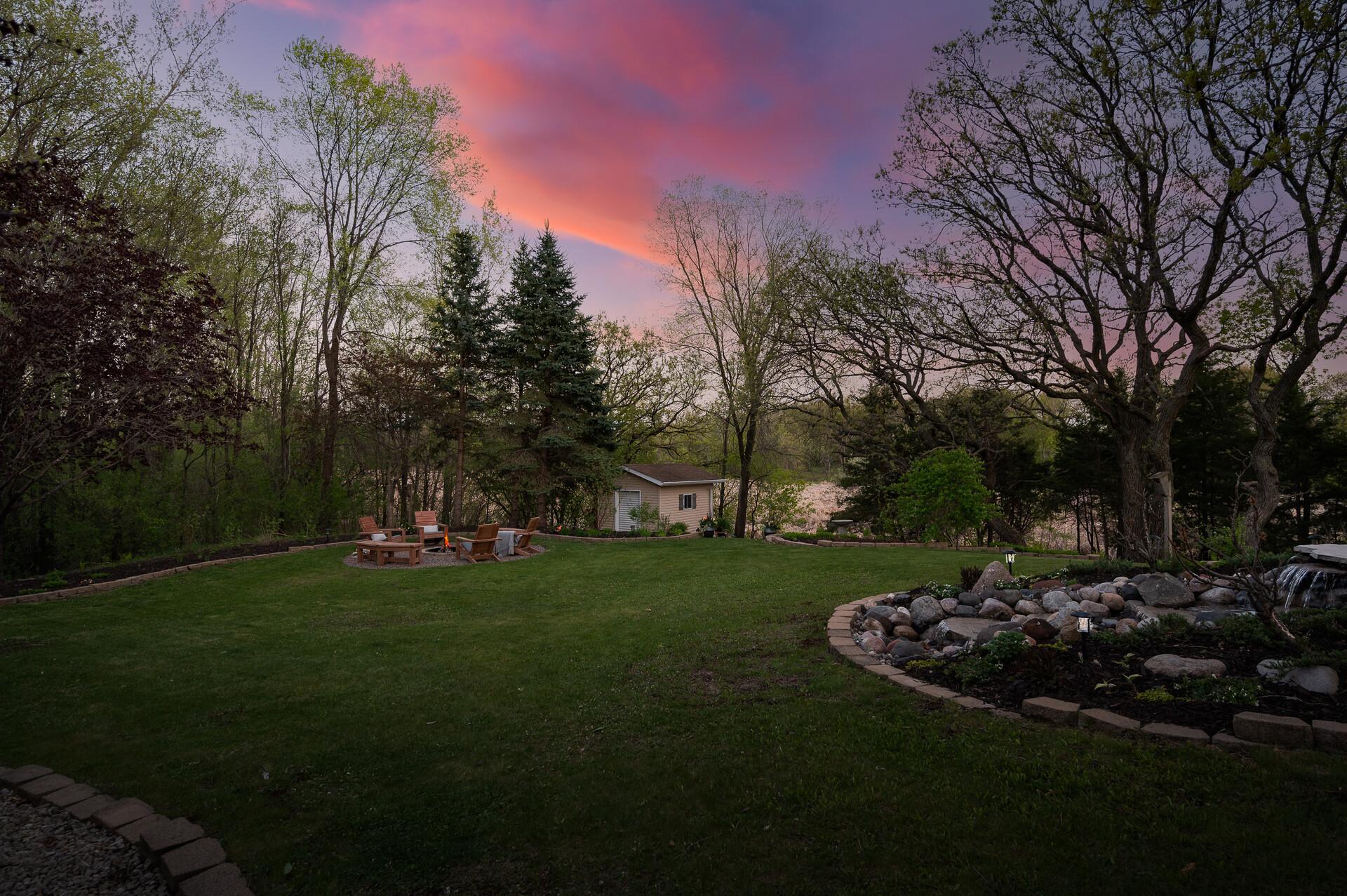 Rare pond views and mature trees create a truly unforgettable backdrop, offering privacy, tranquility, and a one-of-a-kind outdoor experience.