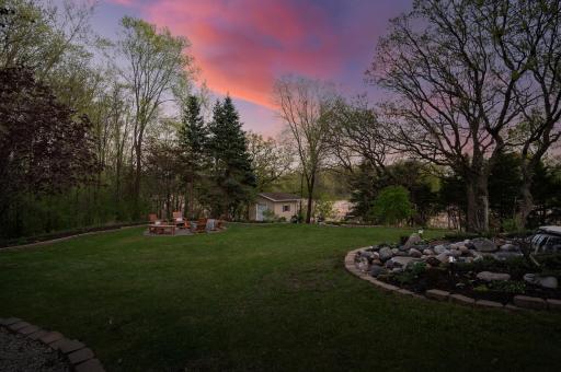 Rare pond views and mature trees create a truly unforgettable backdrop, offering privacy, tranquility, and a one-of-a-kind outdoor experience.
