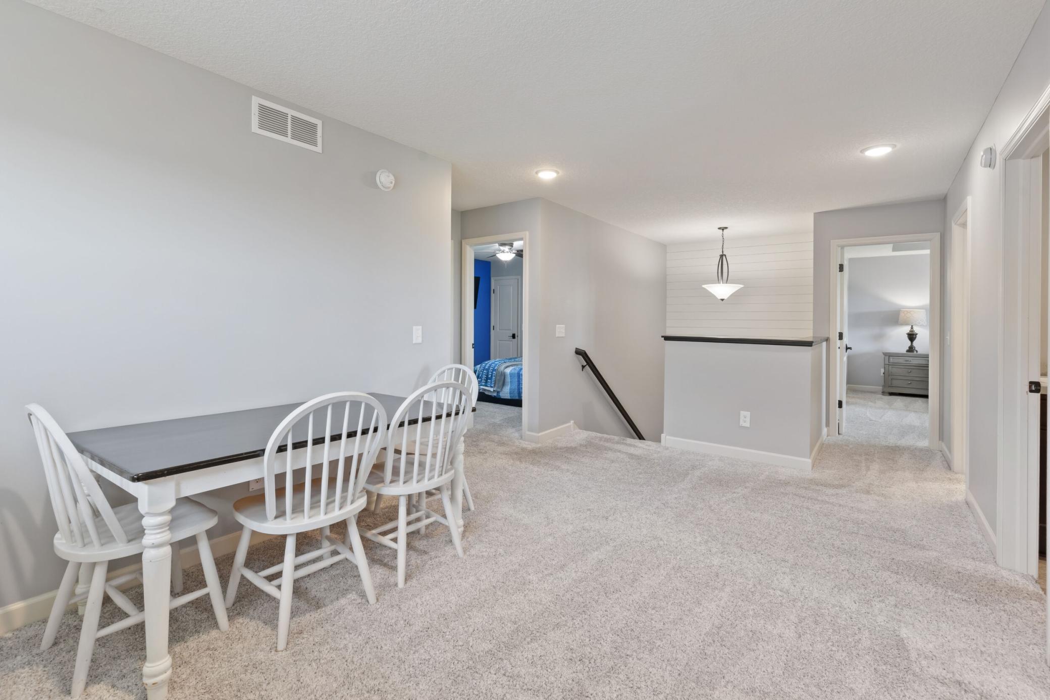 This loft at the top of the upper level is a great space for a study area or additional hang out space
