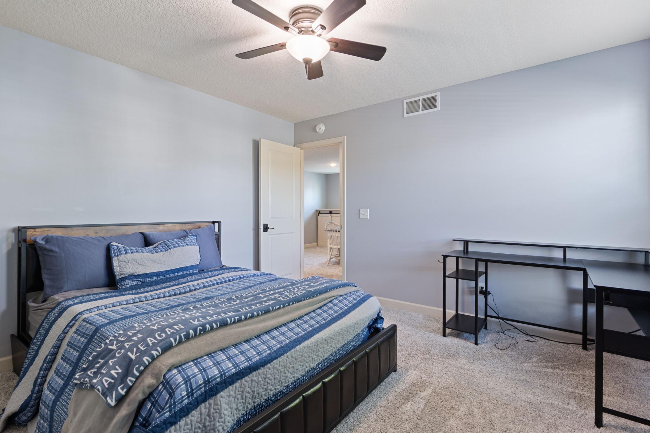 This bedroom also has a walk in closet.