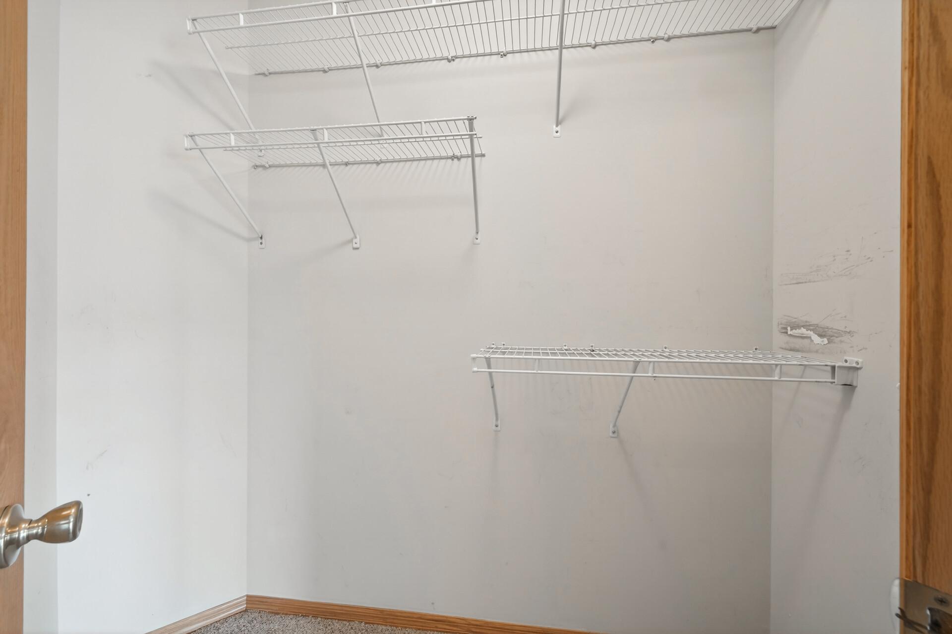 Primary walk-in closet.