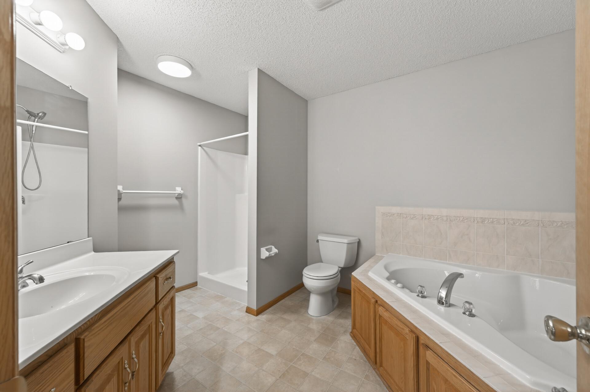 Primary bath with separate tub & shower.