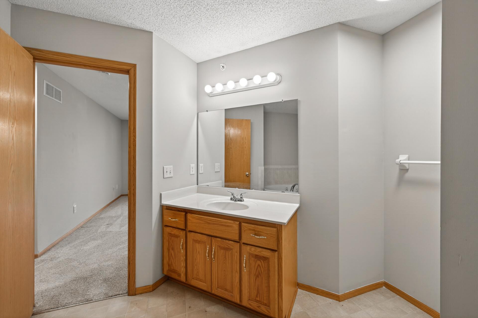 Primary bath with separate tub & shower.