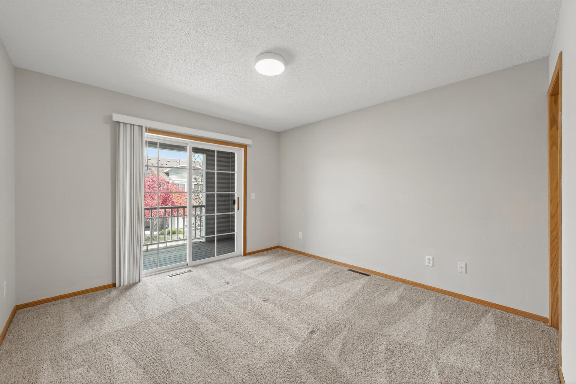 Primary bedroom suite on the upper level.
