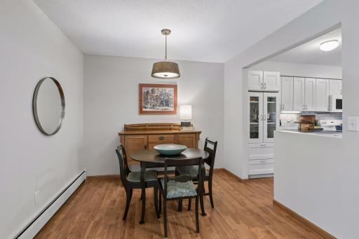 Separate dining room open to remodeled kitchen.