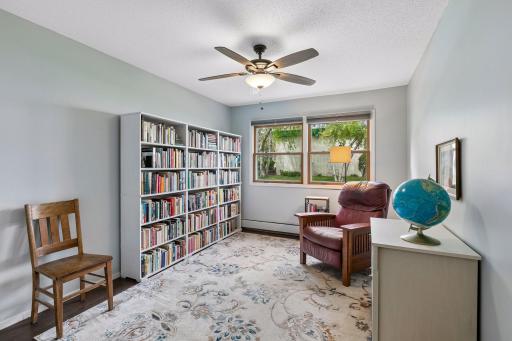Bedroom 2 - spacious. Current purpose is library and reading room. Windows to green space.