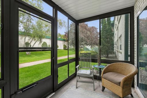 Screened/combination windows enclose this patio. Enjoy your your morning cup.