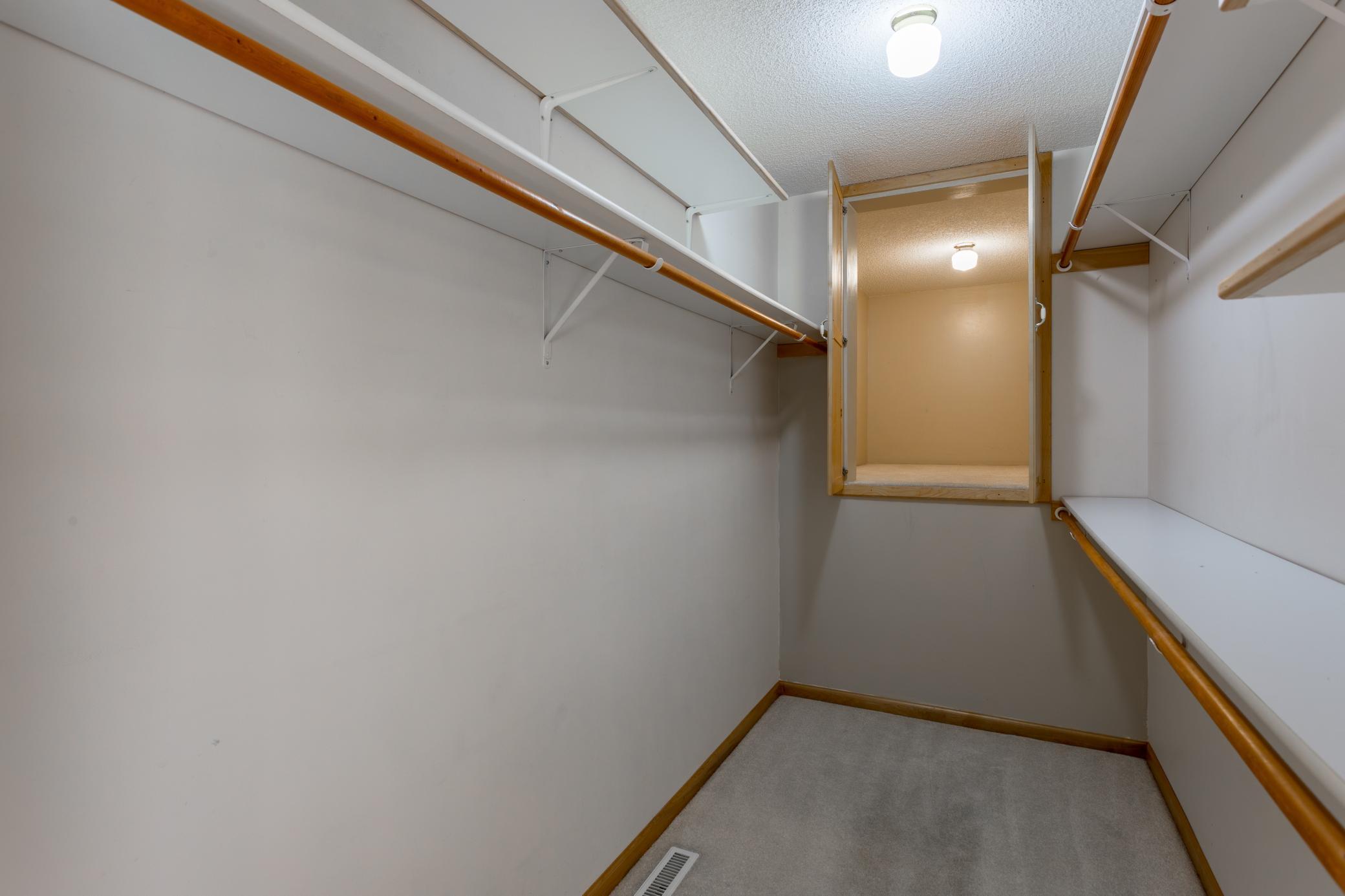 Large walk in closet in primary bedroom, plus bonus storage area