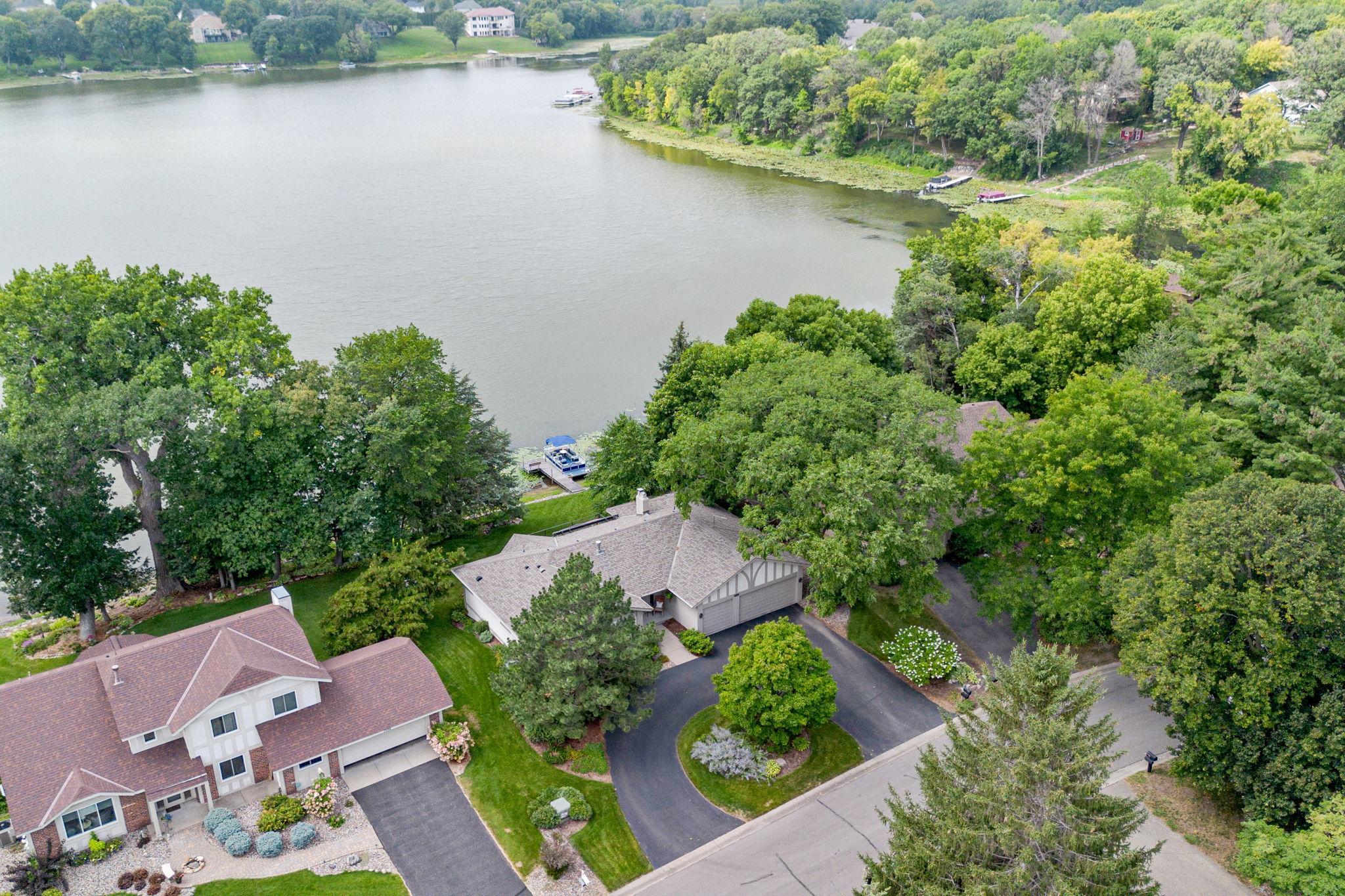 Private Mitchell Lake Setting with Half Circle Driveway