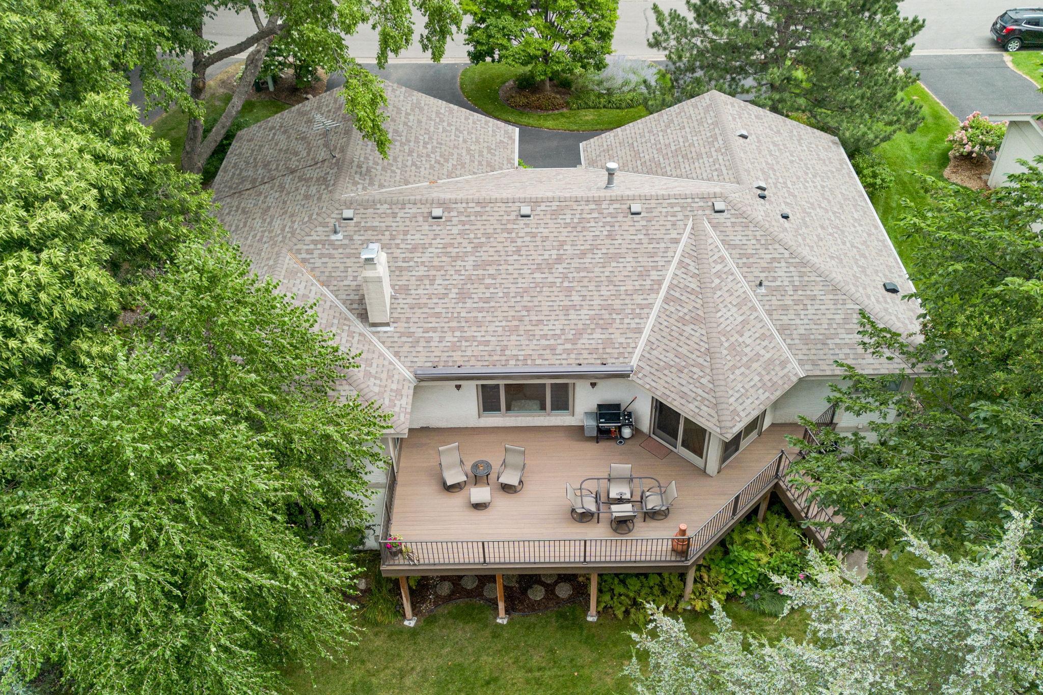 Sprawling Upper Deck Surrounded by Mature Trees