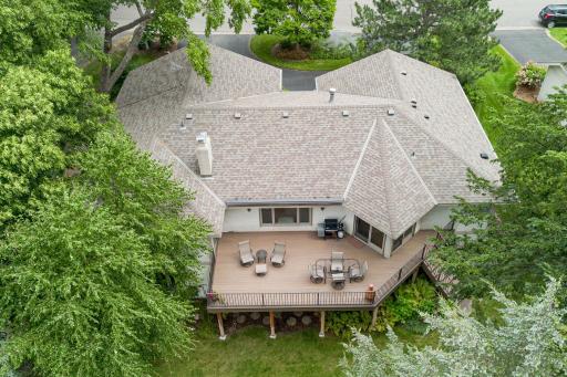 Sprawling Upper Deck Surrounded by Mature Trees