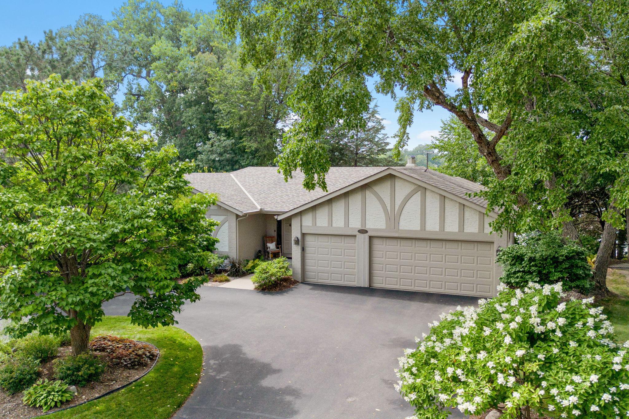 Nestled Among Mature Trees on Mitchell Lake