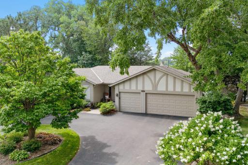 Nestled Among Mature Trees on Mitchell Lake