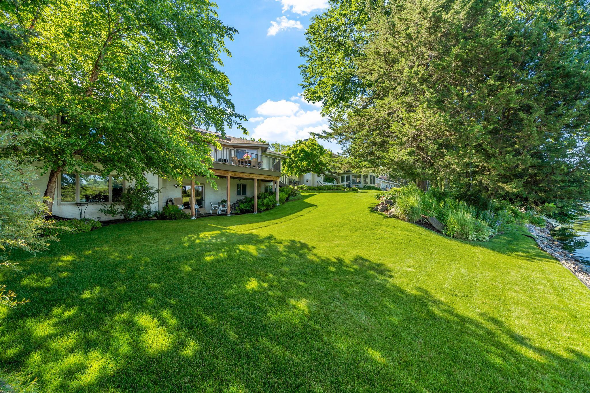 Expansive Backyard with Mitchell Lake Shoreline Access