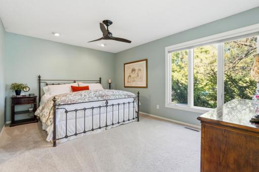 Spacious Ownerâs Suite with Tree Lined Views