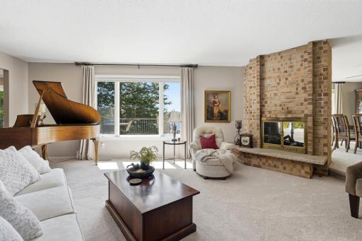 Brick Fireplace Living Room with Lake Views