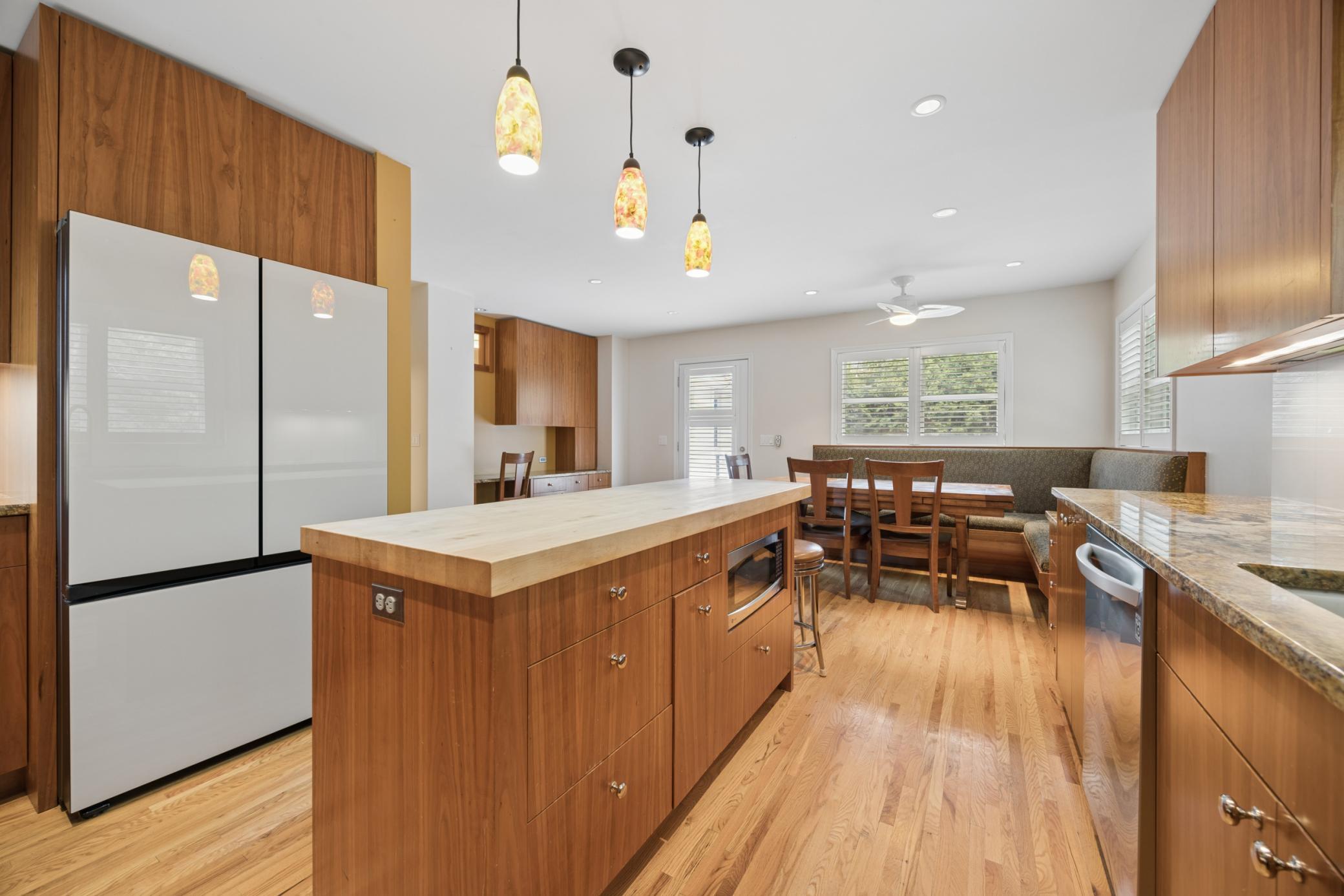 Counter tops are granite, island counter is butcher block