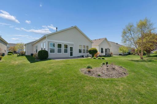 Expansive backyard with open green space and scenic nature views.