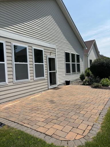 Large patio with room for plenty of furniture and grilling