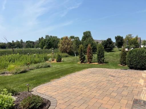Private paver patio perfect for outdoor dining and entertaining.