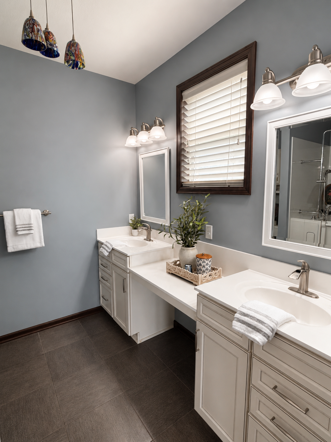 Primary bath with dual vanity sink and makeup station.