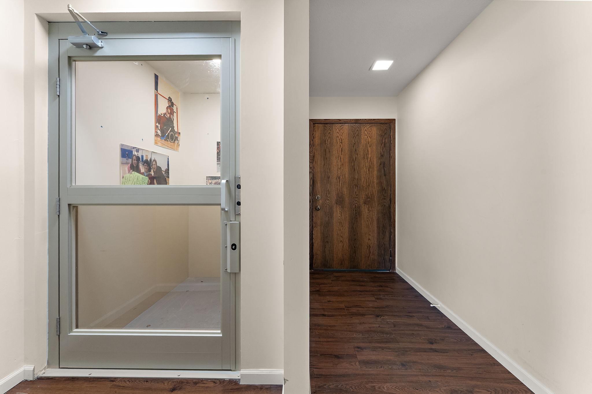 The elevator is just off the garage entrance.
