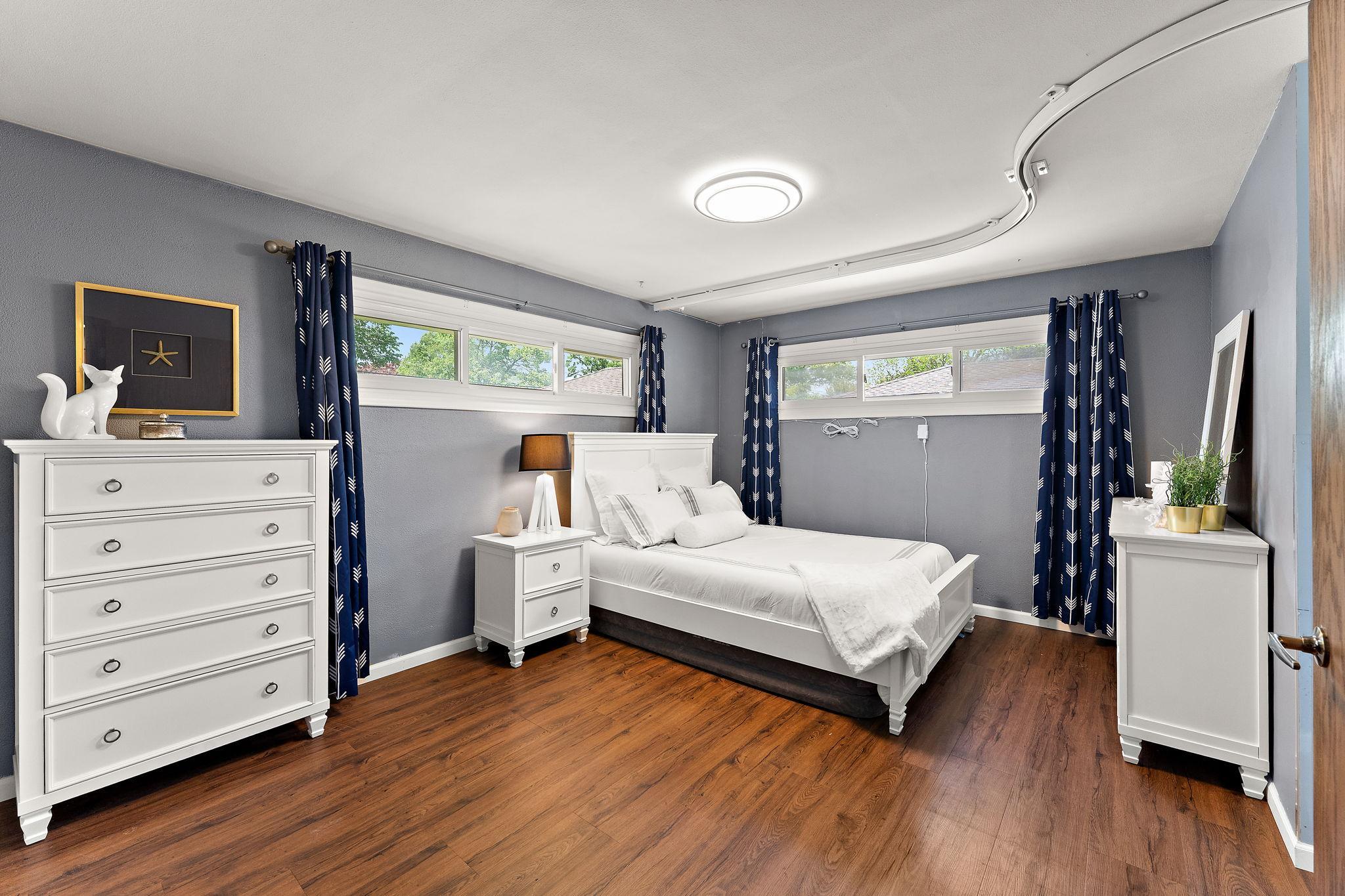 The primary bed is fully ADA accessible. It currently has a Sure Hands Lift System that travels between the bedroom & Bath. It can be removed & the ceilings rpaired prior to closing if it is not desired.