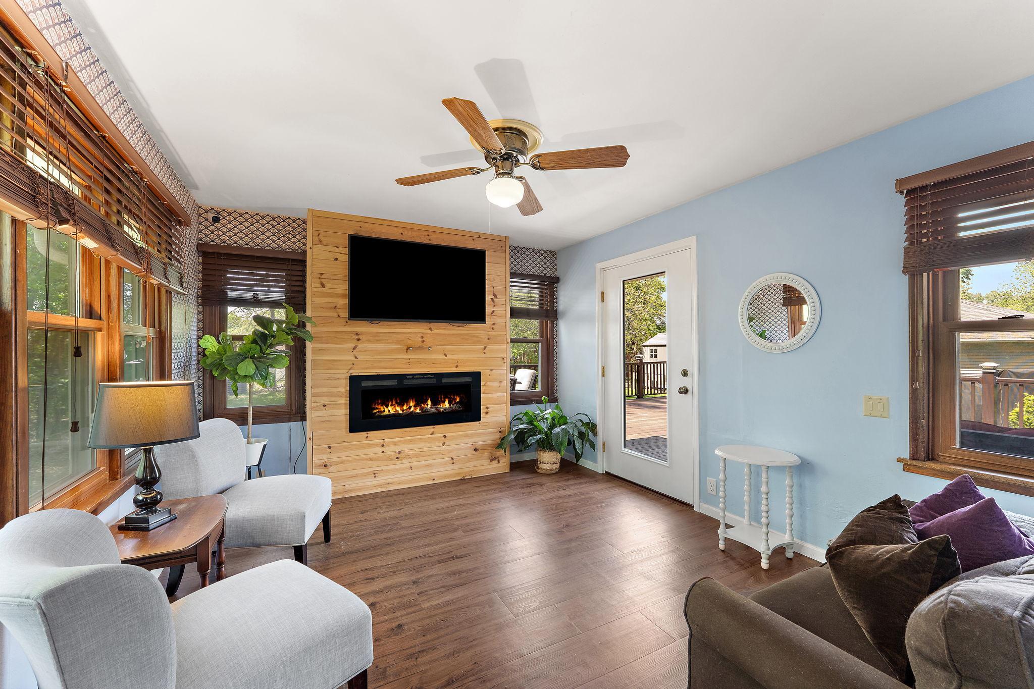 Right off the kitchen is the 4 season sunroom, which walks out to the deck.