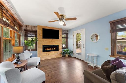 Right off the kitchen is the 4 season sunroom, which walks out to the deck.