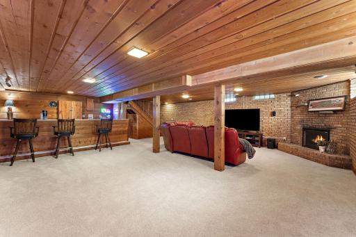 Room for a pool table? Yes! Ping Pong Table? Yes! Kids play world? For sure! The fireplace has an electric insert that actually warms the room!