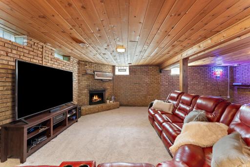 Super MCM brick walls & fireplace, along with new carpet.