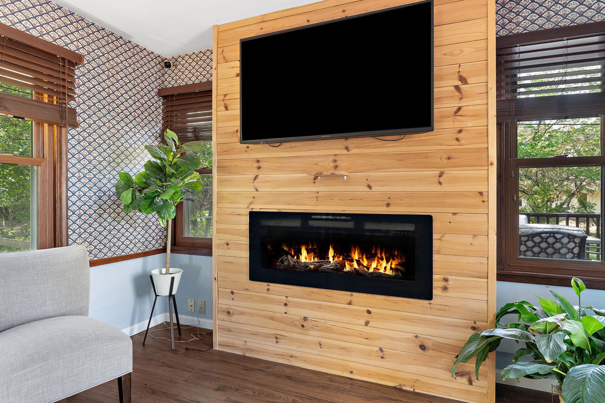 You will find a custom fireplace/TV wall.