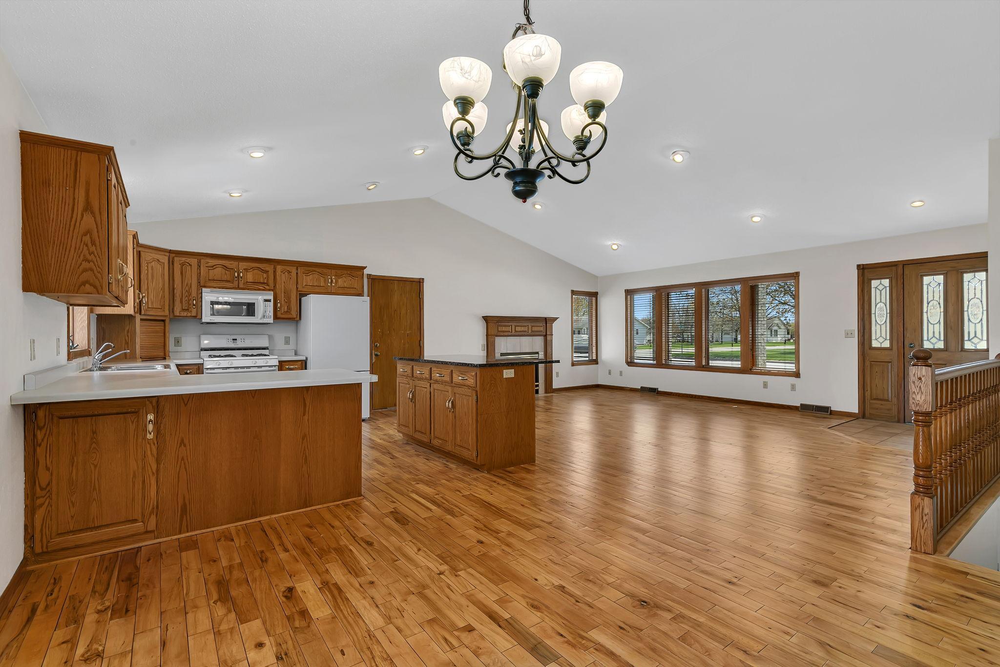 View from dining room to kitchen & living room