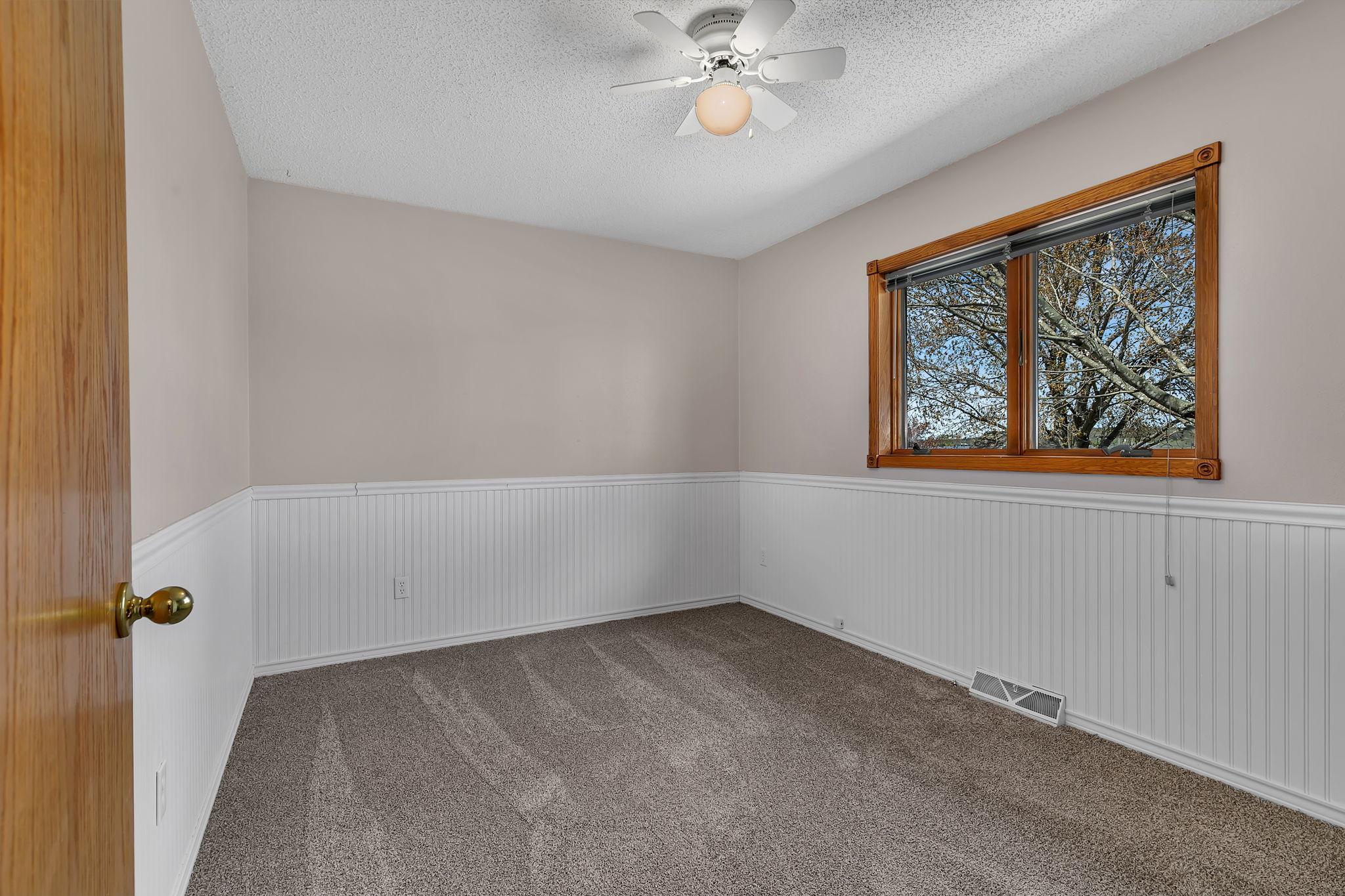 2nd Bedroom on main floor. Has a walk-in closet.