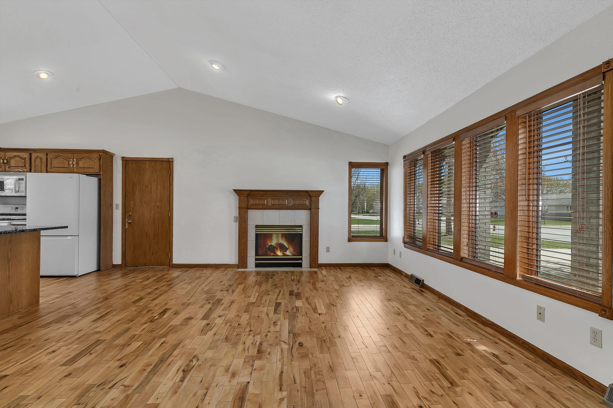 Living room with door to garage