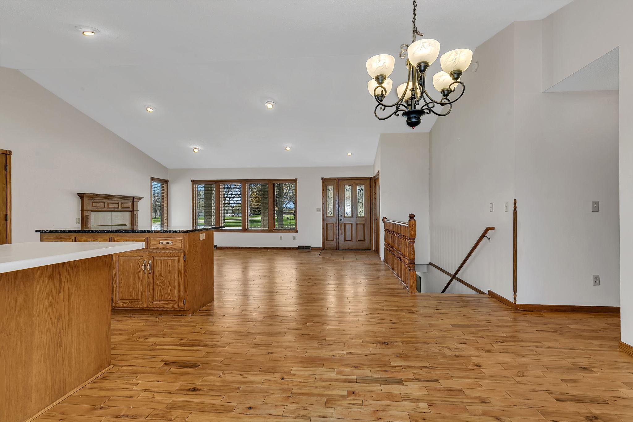 View from dining room with stairs to lower level