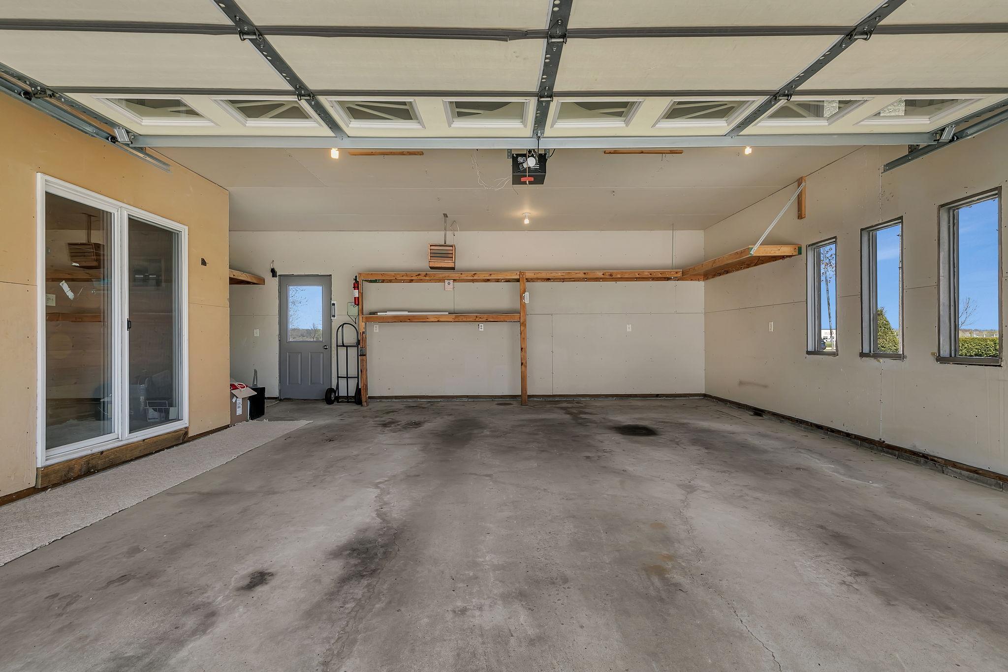 Interior of attached front garage. Heated & insulated with mud room between garage & home.