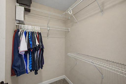 Primary bedroom has a spacious walk in closet.