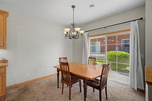 Simply slide open the patio doors for seamless access to your patio, the perfect spot for morning coffee or evening lounging.