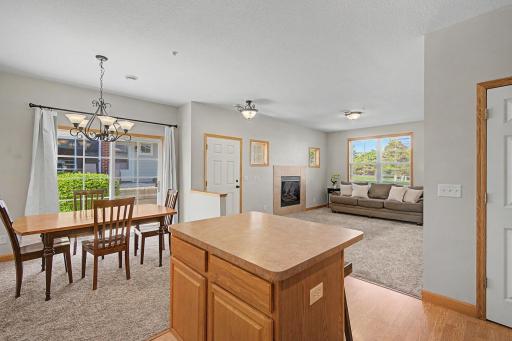 Enter through the front door into a bright, open-concept main level designed for effortless living and entertaining.